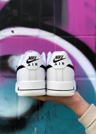 Унісекс кросівки nike air force white black5 фото