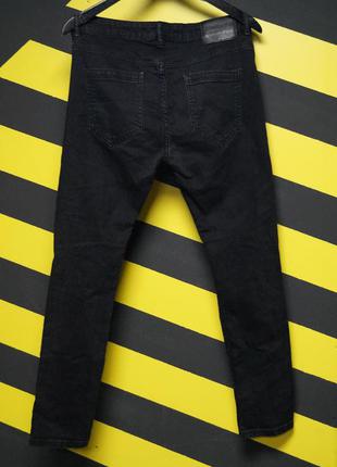Зауженные стрейчевые джинсы c потертостями4 фото
