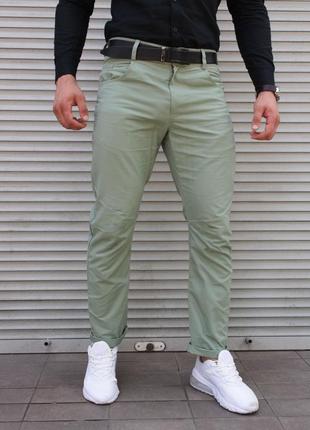 Бирюзовые брюки чинос мужские , зауженные от колена1 фото
