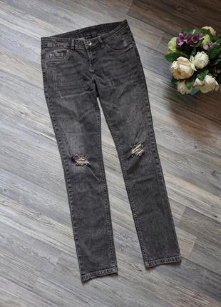 Стильные жеские серые джинсы с дырками на коленях размер 46/483 фото