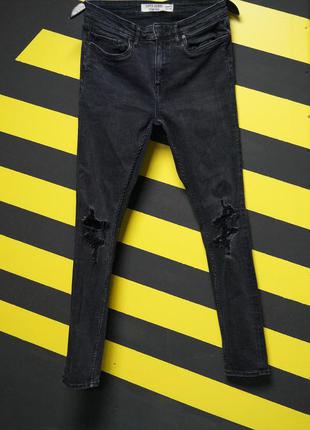 Зауженные стрейчевые джинсы с потертостями и дырками на коленях (super skinny stretch)