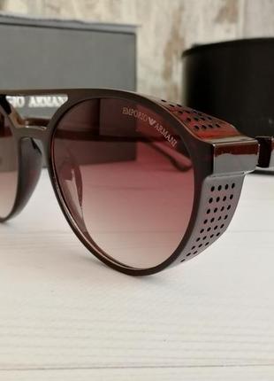 Стильні брендові чоловічі сонцезахисні окуляри
