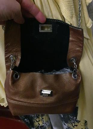 Кожаная сумочка в цвете бронза.4 фото