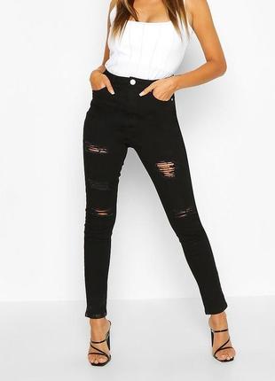 Чёрные джинсы с дырками3 фото
