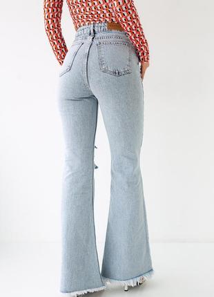 Клешные джинсы с неподшитым низом2 фото