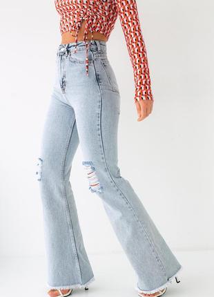 Клешные джинсы с неподшитым низом5 фото