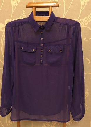 Дуже гарна і стильна брендовий блузка.