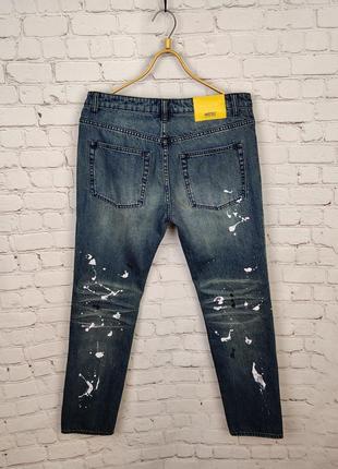 Мужские джинсы синие в пятнах краски разрисованные wesc
