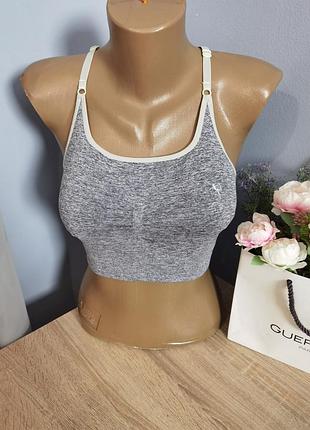 Топ еластичний спортивний розміру 6-8/s