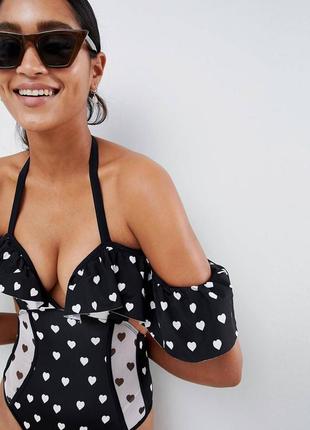 Купальник в горошек с вырезами