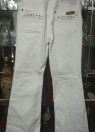 Классные белые новые фирменные  джинсы раз.14/402 фото