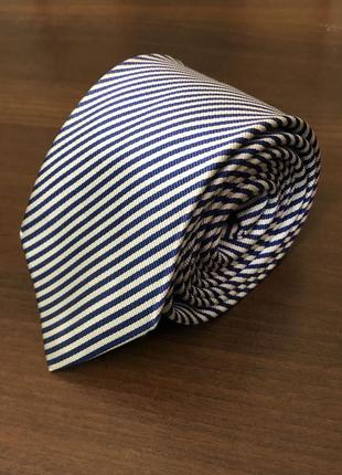 Новий шовковий галстук в біло- чорну полоску1 фото