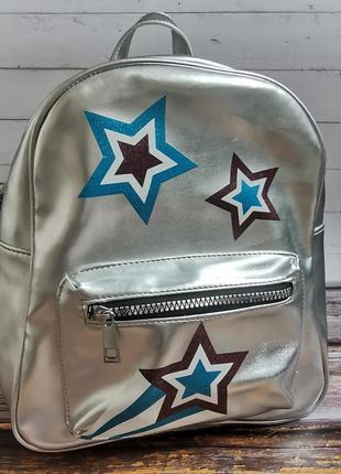 Роскошный рюкзак серебристого цвета со звездами