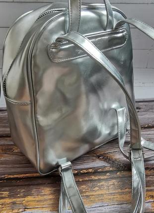 Роскошный рюкзак серебристого цвета со звездами4 фото