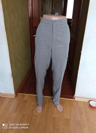 Штани з кишенями