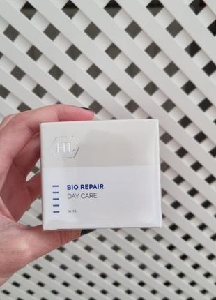 Денний захисний крем holy land cosmetics bio repair day care