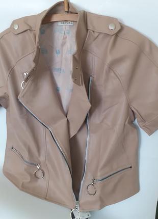 Куртка пиджак кожаный с коротким рукавом3 фото