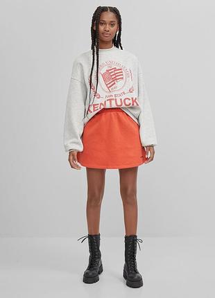 Котонова спідничка bershka з невеличкою баєчкою