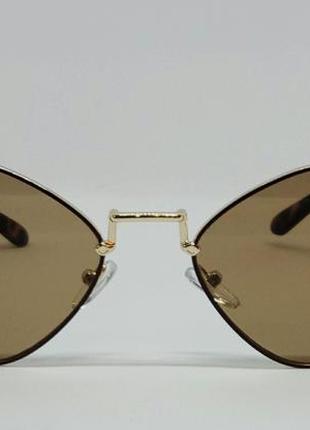Жіночі сонцезахисні окуляри модні ромби коричневі в золотому металі2 фото
