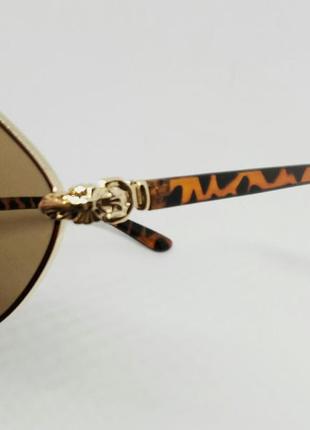 Жіночі сонцезахисні окуляри модні ромби коричневі в золотому металі6 фото