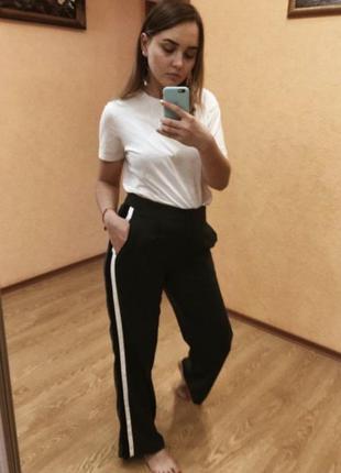 Брюки кльош з лампасами