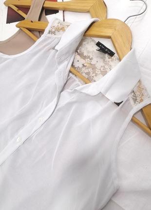 Блузка без рукавов белая с кружевом воротником amisu