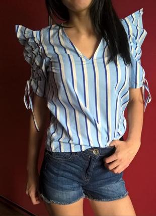 Качественная эффектная хлопковая блуза с объемными плечами6 фото