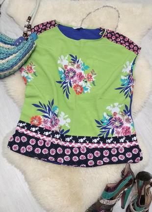 Финменная блуза с цветочным принтом.1 фото