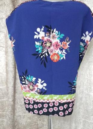 Финменная блуза з квітковим принтом.4 фото