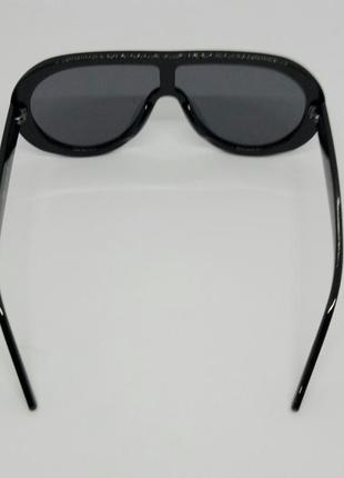 Стильные солнцезащитные очки маска унисекс чёрные4 фото