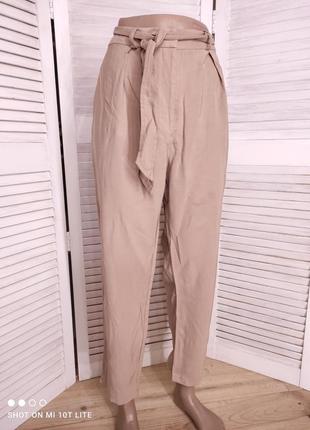 Штани бежеві