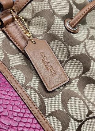 Ексклюзивна жіноча сумка coach signature stripe drawstring carryall premium bag7 фото