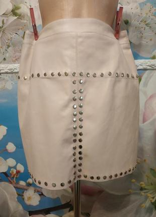 Кожаная юбка нюдового цвета с заклепками 12-14р9 фото