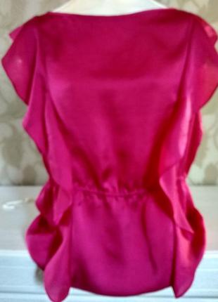 Яркая лёгкая блузка с рюшками