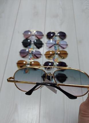 Дитячі сонцезахисні окуляри "van regel"9 фото