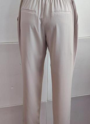 Стильные брюки zara с боковыми карманами2 фото