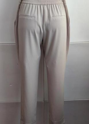 Стильные брюки zara с боковыми карманами4 фото