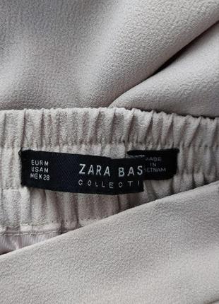 Стильные брюки zara с боковыми карманами6 фото