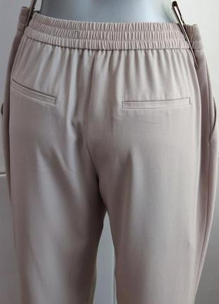 Стильные брюки zara с боковыми карманами5 фото