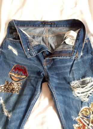 Класні джинси з потертостями zara7 фото