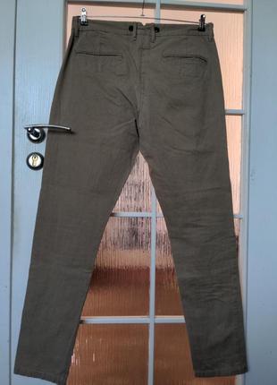 Классные штаны от известного бренда.4 фото