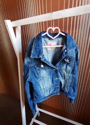 Джинсовці,джинсова куртка з потертостями2 фото