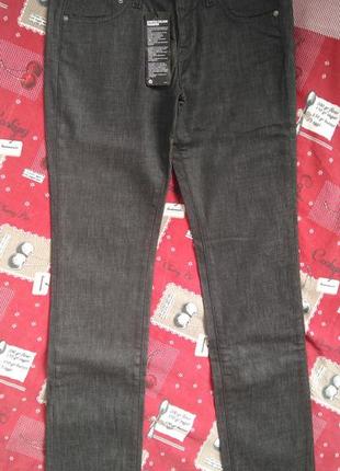 Жіночі джинси чорного кольору s.1 фото