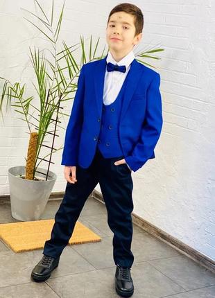 Стильний костюм. відмінної якості на хлопчика: піджак, сорочка, жилет, метелик і стильні штани.