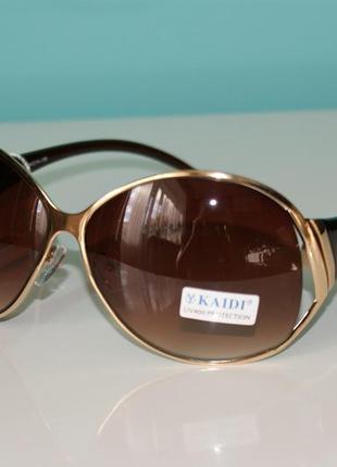 Стильные женские солнцезащитные очки kaidi, защита - uv 4002 фото
