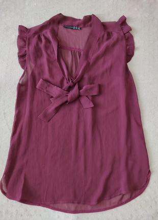 Блузка вишневого кольору з бантом1 фото