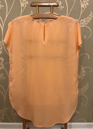 Очень красивая и стильная брендовая блузка оранжевого цвета...100% modal 20.2 фото