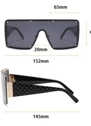 Цельные солнцезащитные очки в металлической оправе5 фото