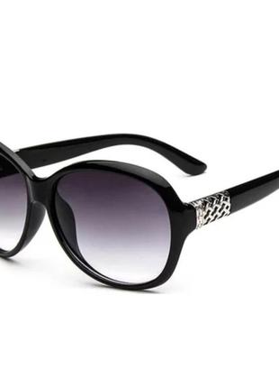 Жіночі овальні сонцезахисні окуляри з градієнтними склом1 фото