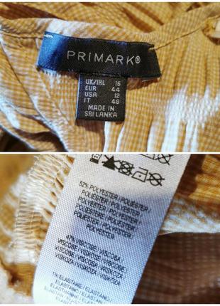 Блуза фактурна рукав-ліхтарик з баскою рюшів в клітку цятку primark з жатой тканини6 фото